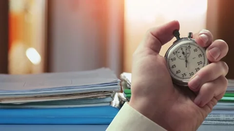 Animation of paper documents and magazines on a table and stopwatch in a hand Видео 235154992