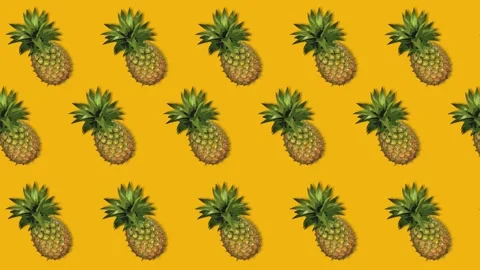 Animation with pineapple oscillating on an orange background Stock Footage 310790447