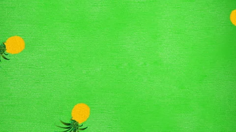 Animation of pineapples moving on green background Stock Footage 312472778