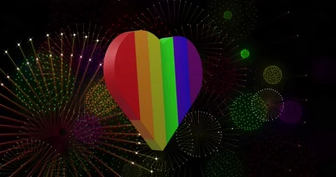 Animation of pride rainbow heart and fireworks exploding on black background Stock Footage 235872148