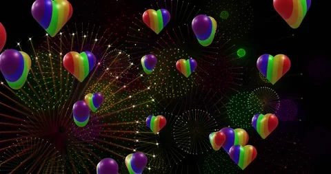 Animation of pride rainbow hearts and fireworks exploding on black background Stock Footage 328161009