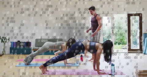 Animation of processing data over diverse male instructor and female yoga class Stock Footage 265558389