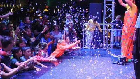 Animation program for children at the resort. Clowns entertain guests of the Video stock 93948732