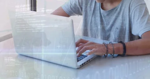 Animation of programming data and graphs moving over caucasian boy studying over 動画素材 330412938