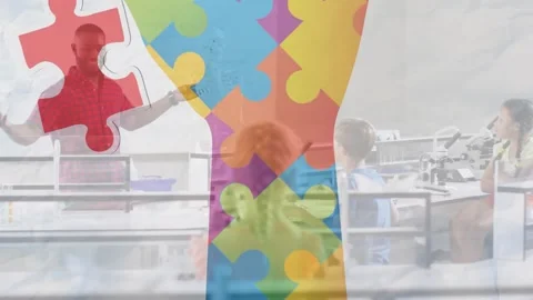 Animation of puzzle pieces with hand icon over diverse schoolchildren and Stock Footage 329108886