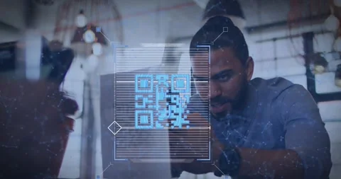 Animation of qr code and digital interface over diverse couple using technology Stock Footage 329015935