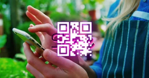 Animation of qr code and sale text over woman with smartphone Stock Footage 328645856