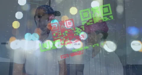Animation of qr code and spots over diverse business people using computer Stock Footage 326032042