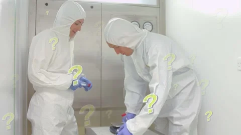 Animation of question marks over caucasian female and male lab workers in safety Stock Footage 328009726