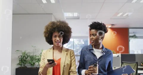 Animation of question marks over diverse business people working at office Stock Footage 328927841