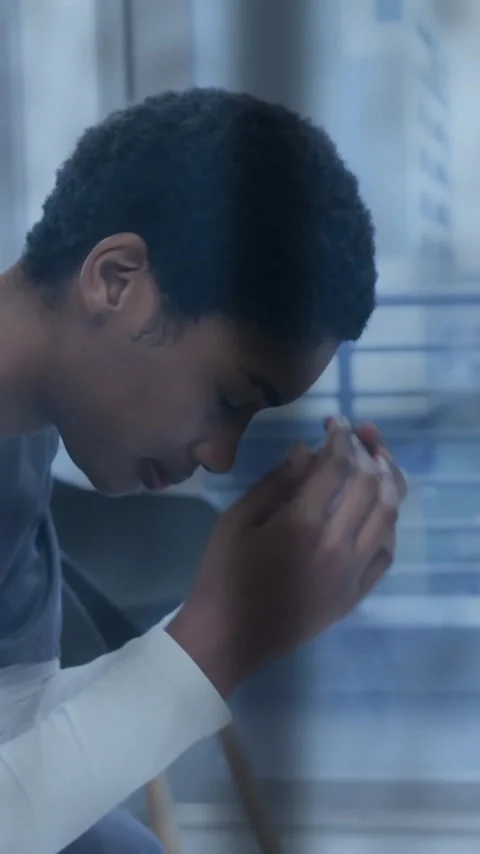 Animation of rain on window over unhappy african american female doctor holding Stock Footage 343714265