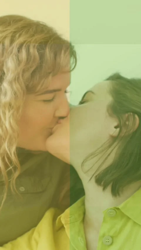 Animation of rainbow flag over lesbian couple kissing Vídeo Stock 342136823