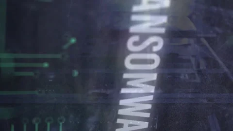 Animation of ransomware text, computer language, binary codes, circuit board Stock Footage 312696750