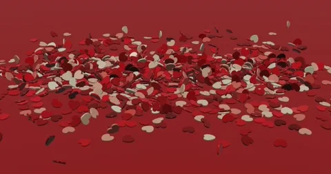 Animation of red and cream 3D hearts falling against red surface and scattering Stock Footage 132463208