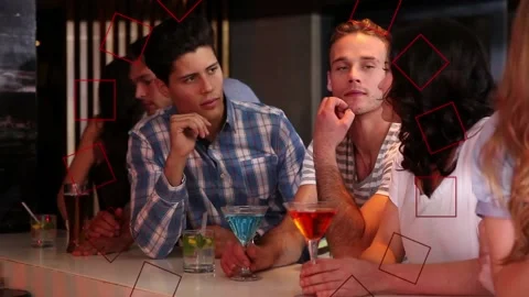 Animation of red circle pattern over happy group of friends having fun at party Stock Footage 157349583