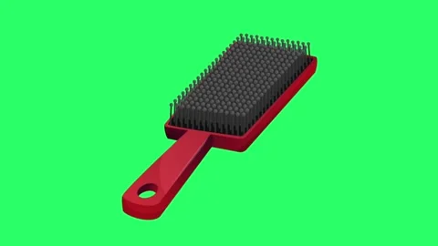 Animation red comb on green screen. Stock Footage 269957987