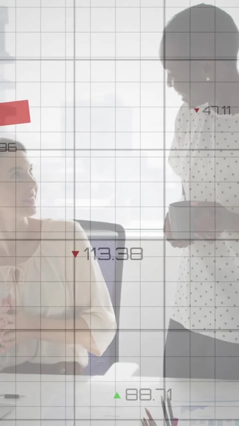 Animation of red graph processing over diverse female colleagues talking at Stock Footage 320513339