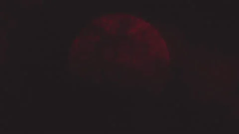 Animation of Red Horror Moon Behind Dark Clouds Video stock 166868845