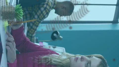 Animation of rotating globe and computer language over caucasian woman analyzing Stock Footage 313166408