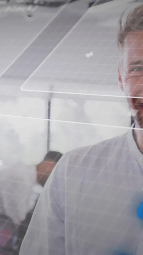 Animation of rotating globe and computer language over smiling caucasian man Stock Footage 344803161