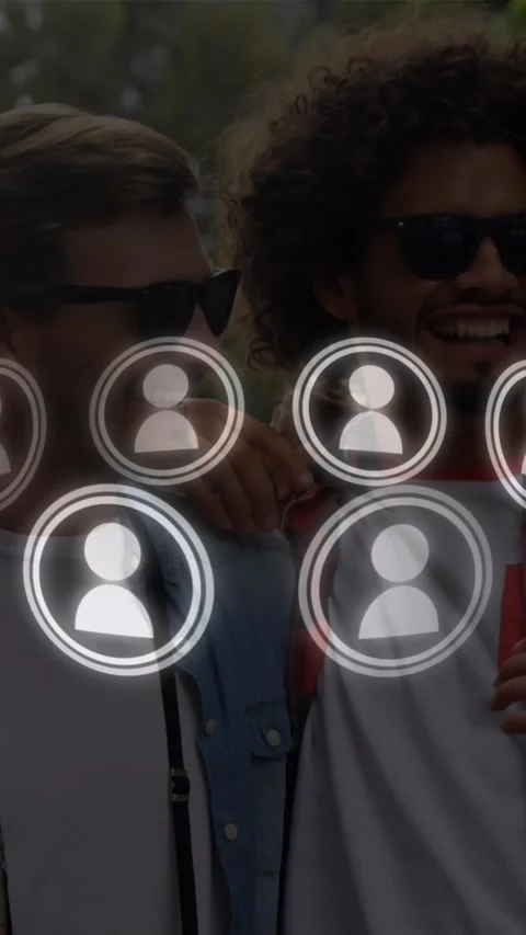 Animation of rotating profile icon in circles over diverse friends talking Stock Footage 321265169