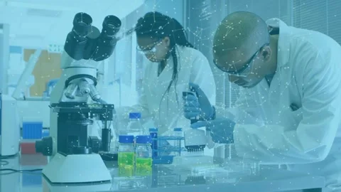 Animation of rotating shapes and data over business people using tablet talking Stock Footage 330657839