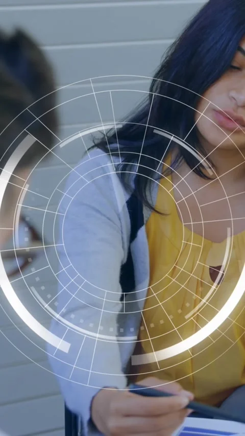 Animation of round scanner against diverse man and woman discussing over a Stock Footage 341976792