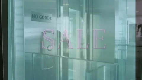 Animation of sale text over empty office Stock Footage 330658179