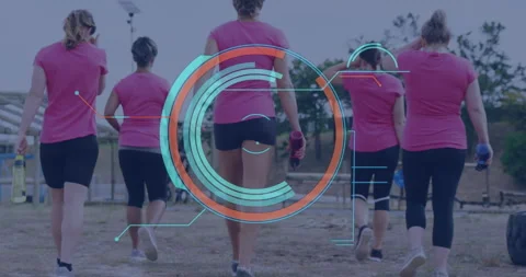 Animation of scanner processing data over rear view of diverse woman running at Stock Footage 260973342