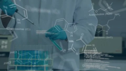 Animation of scientific data processing over male scientist in laboratory Stock Footage 326890659