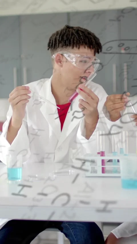 Animation of scientific data processing over diverse students in laboratory Stock Footage 343824305