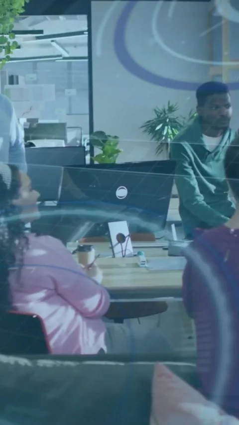 Animation of scope and data processing over diverse business people in office Stock Footage 343829076