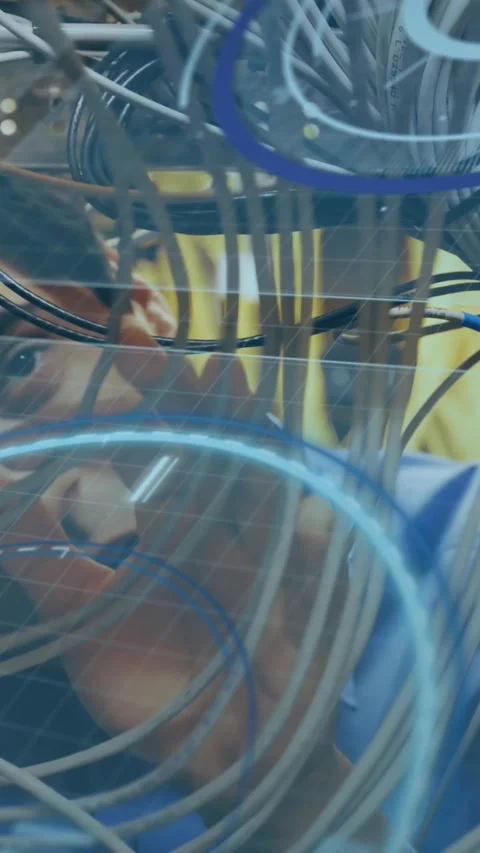 Animation of scope scanning and data processing over caucasian it man computer Stock Footage 343738386