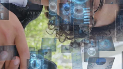 Animation of screens with circles, graphs, computer language over man using Stock Footage 314123799