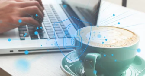 Animation of security padlock icon against mid section of woman using laptop at Stock Footage 326427125