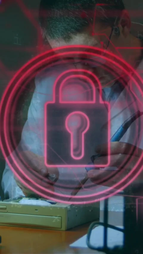 Animation of security padlock icon over caucasian male engineer soldering Stock Footage 344525578