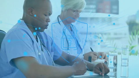 Animation of shapes and padlock over diverse doctors taking notes Stock Footage 263952724