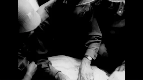 An animation shows the progression of technology from caveman days to the 1960s 스톡 동영상 99411126