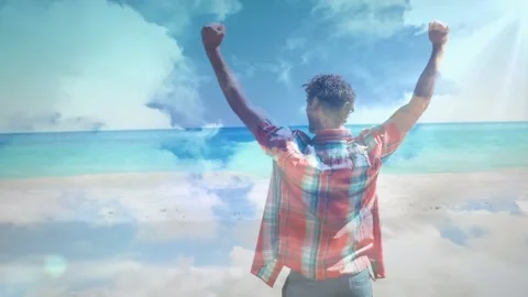 Animation of sky with clouds over biracial man with arms outstretched Stock Footage 192359689