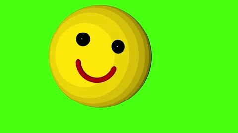 Animation of a smiling emoticon on a green background. Stock Footage 304959958