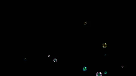 Animation Soap Bubbles Fly Up on a Black Background. Stock Footage 165066184