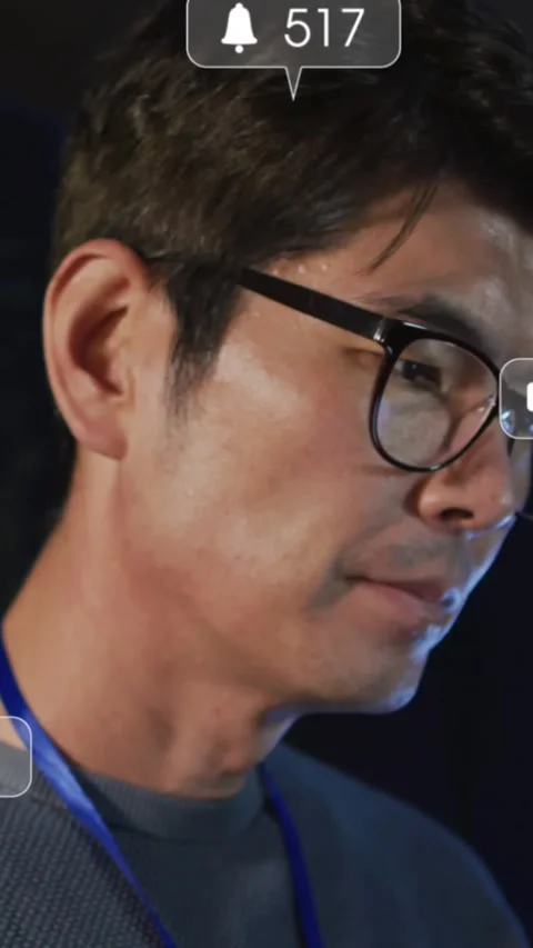 Animation of social media data over asian male it engineer by computer server Stock Footage 324557642