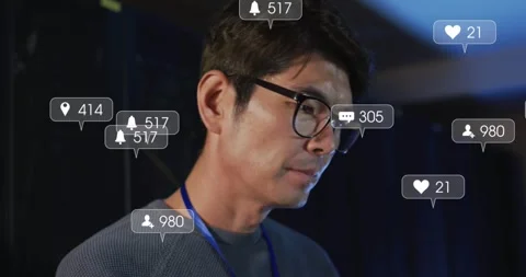Animation of social media data over asian male it engineer by computer server Stock Footage 329614603