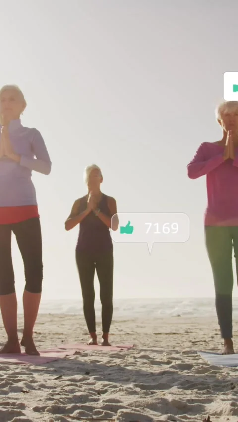 Animation of social media data processing over diverse women exercising on beach Stock Footage 319975096