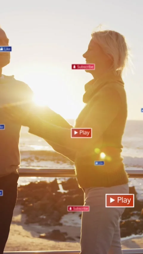 Animation of social media text and icons over caucasian couple on beach Vídeo Stock 342010765