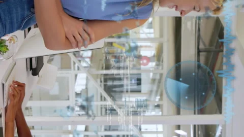 Animation of sonars, computer language over diverse coworkers standing and Stock Footage 313002202