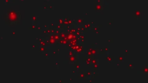 Animation of sparks on a black background. Particles scatter in different direct Stock Footage 153014641