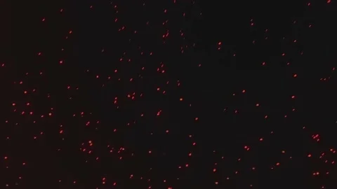 Animation of sparks on a black background. Particles scatter in different direct Stock Footage 153014643