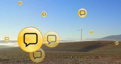Animation of speech bubble icons over windmills on field against clear sky Stock Footage 255172743