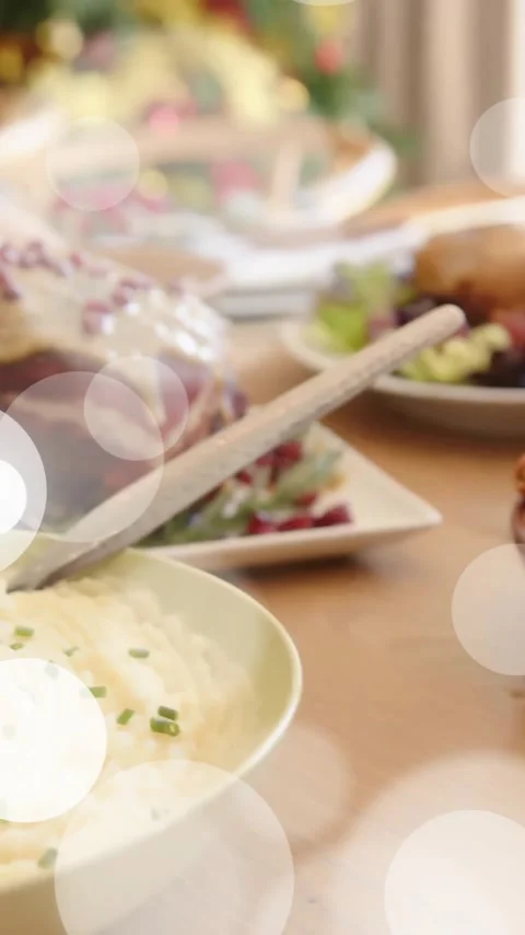 Animation of spots of light over table set for christmas dinner at home Stock Footage 342677239
